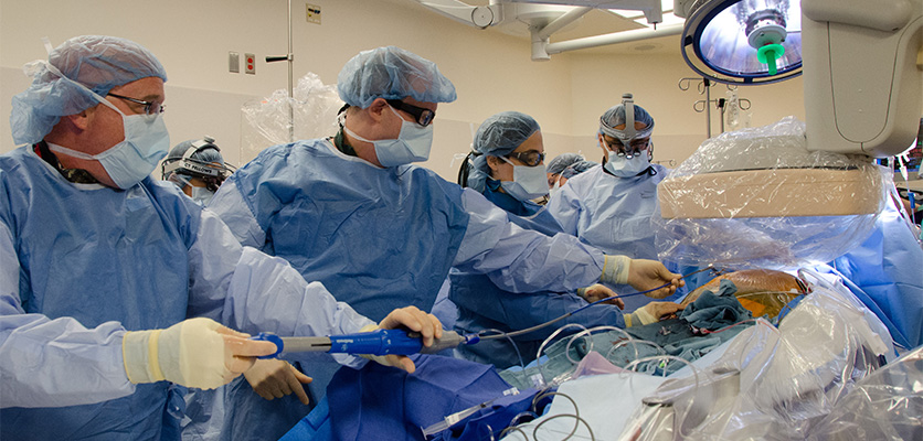 Churyla and Flaherty in operation room